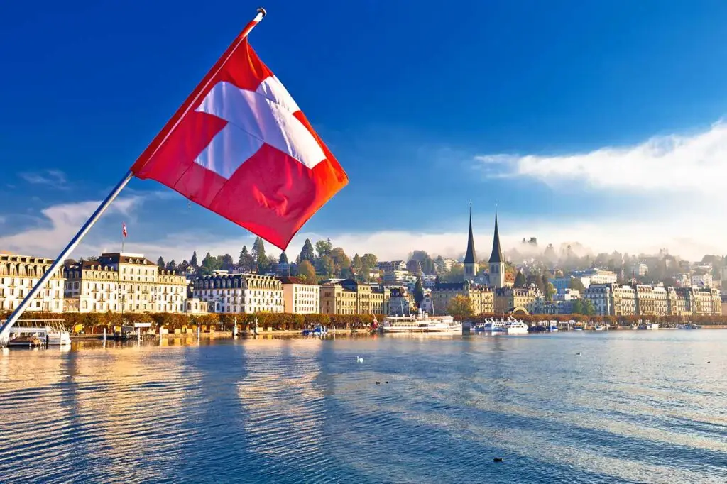 View of Lucerne from the Lake with a Swiss flag