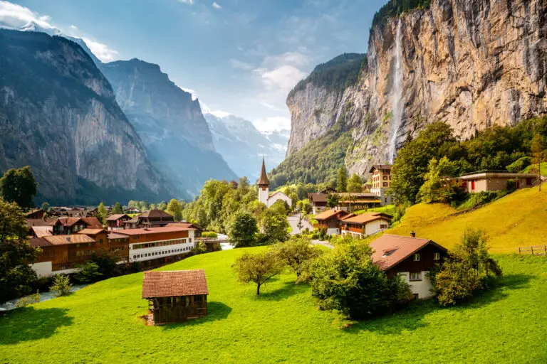 Summer view of alpine valley of Lauterbrunnen. Location place Swiss alp, Bernese Oberland, Europe. Staubbach waterfall is a famous tourist attraction. Natural wallpaper. Discover the world of beauty.
